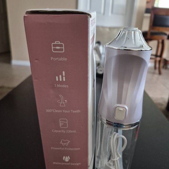 Portable Oral Irrigator - Picture 1 of 2